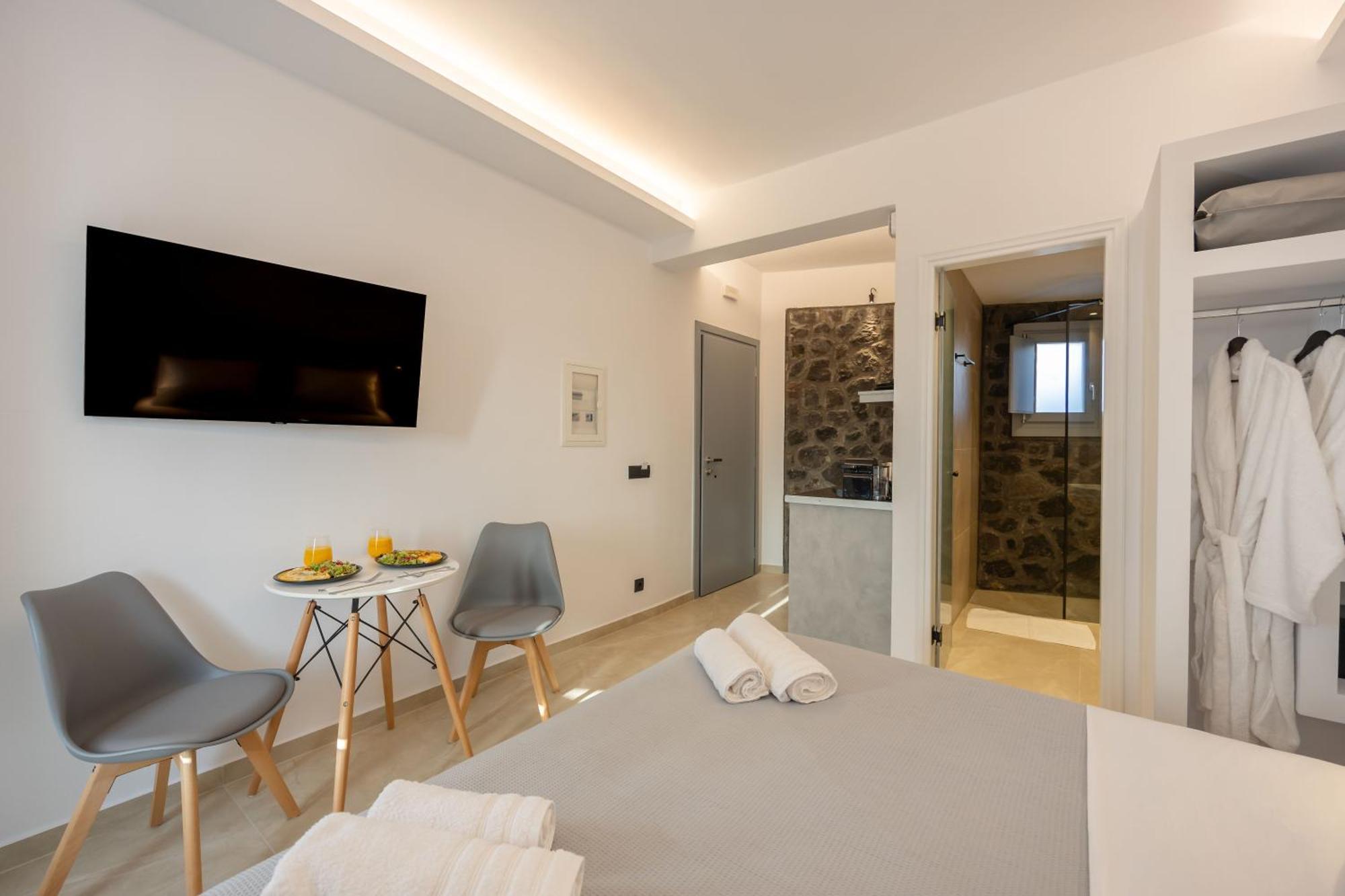 Nastram Suites Oia Szoba fotó