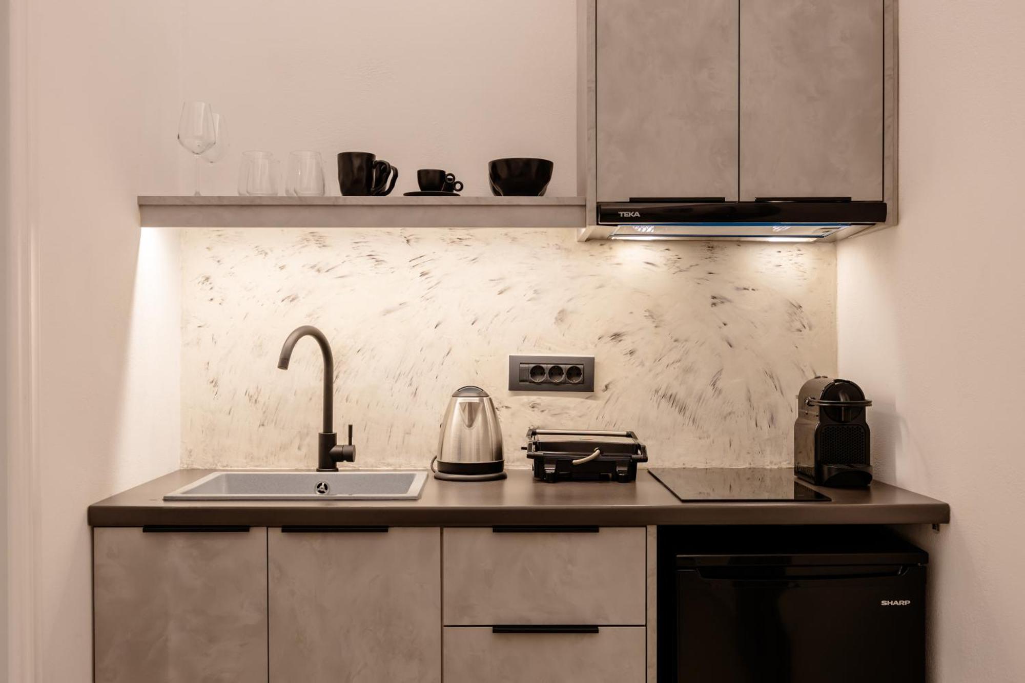 Nastram Suites Oia Szoba fotó